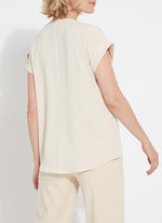 Back image of Lysse tempo short sleeve shirt in light almond. 