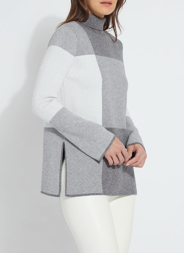 Side image of Lysse Victoria pullover sweater in festive allure check.