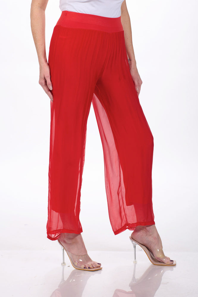 Side image of made in italy red viscose pants. 