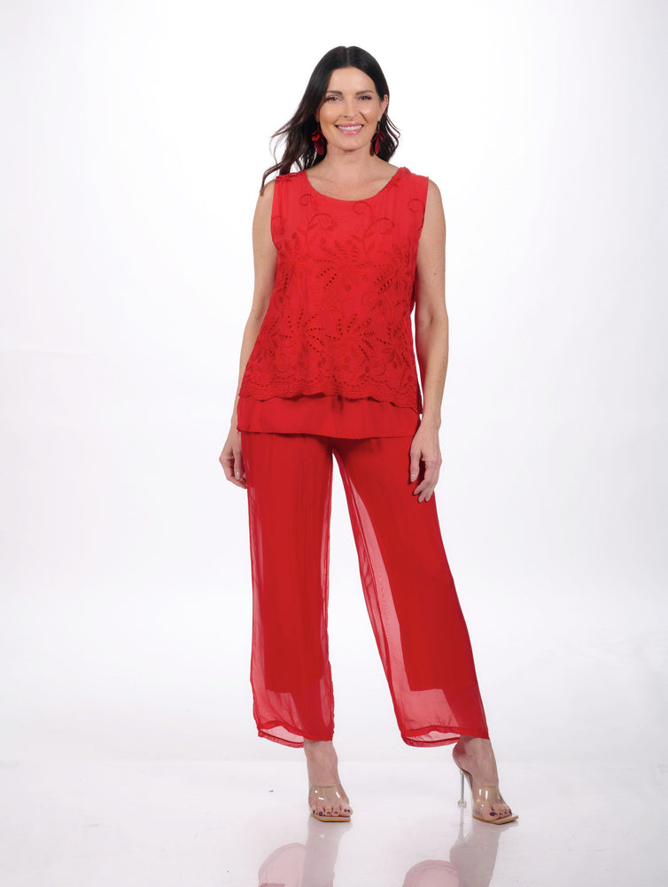 Front image of made in italy red viscose pants. 