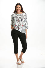 Front image of made in italy abstract faces sweater. 