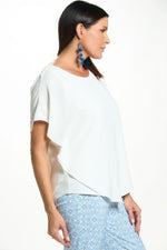 Side image of last tango short sleeve air flow top.