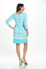 Back image of AnaClare courtney long sleeve printed dress in aqua white fleur. 