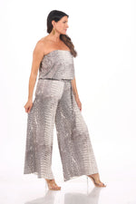 Side image of wide leg jumpsuit in ivory snake print. 