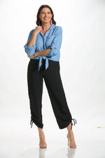 Front image of Made in Italy button and tie front top in blue jean.