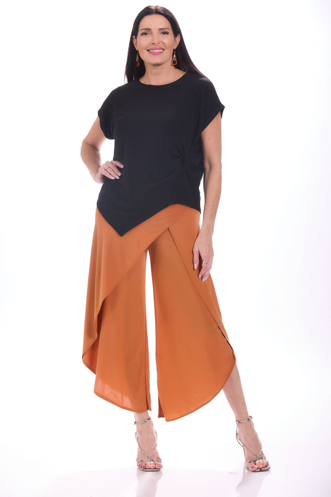 Front image of Mimozza burnt orange wrap pants. 