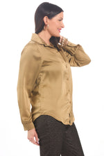 Side image of M Made in Italy gold long sleeve blouse. 