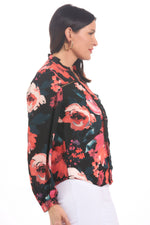 Side image of Elo rose printed long sleeve crepe blouse. 