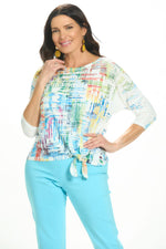 Front image of impulse drop shoulder top in colorful mirage. 