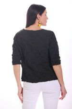 Back image of Shana black crinkle top. 