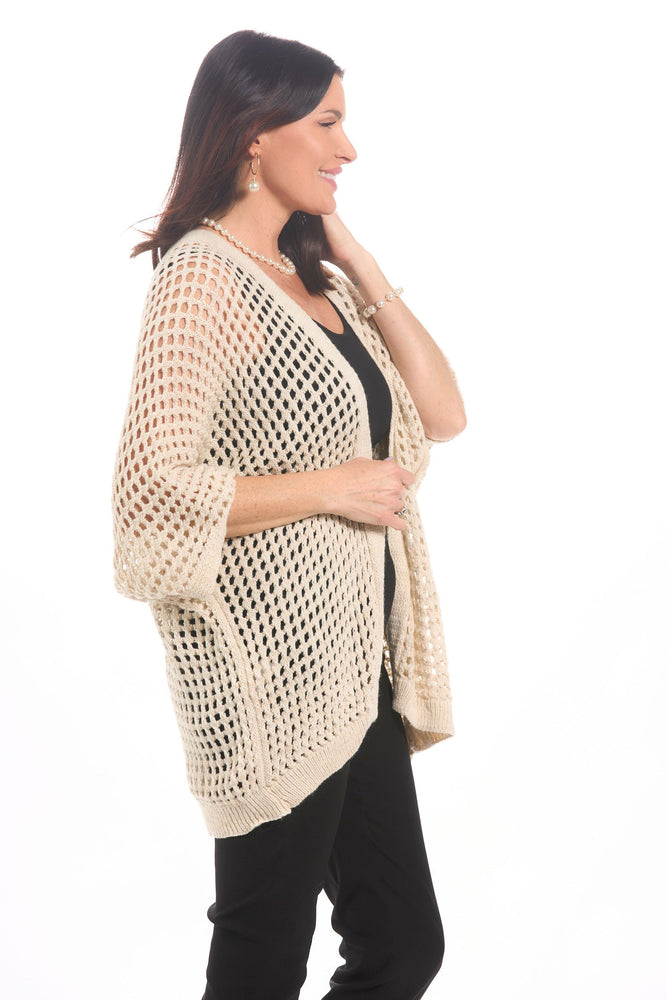 Side image of Gigi Moda open knit cardigan in beige. 