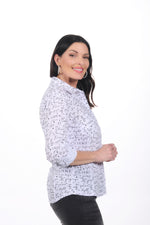 Side image of Elo roll sleeve button front blouse. 