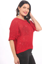 Side image of Look Mode true red shimmer sweater made in italy. 