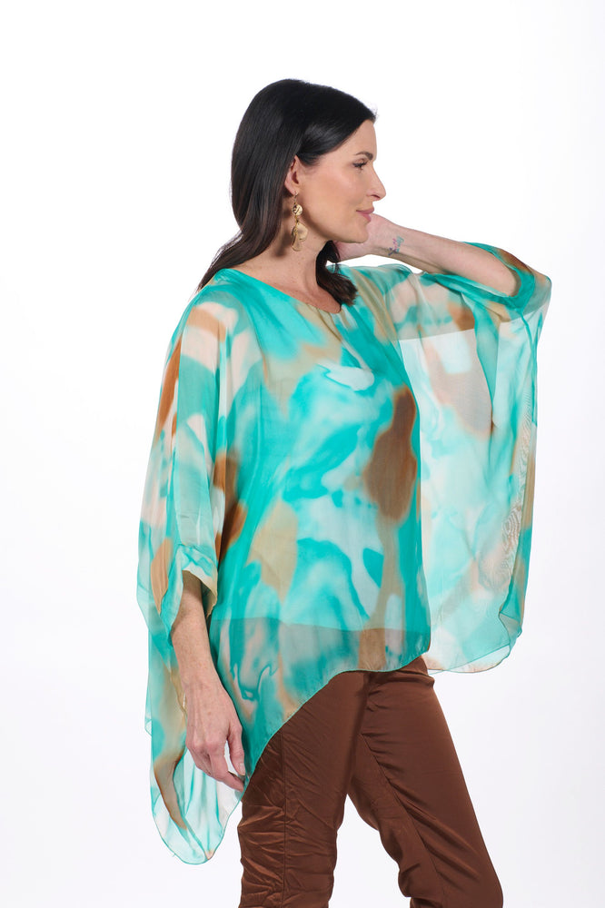 Side image of made in italy turquoise and brown blouse by Gigi Moda.