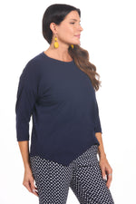 Side image of navy knot top by nally &millie. 