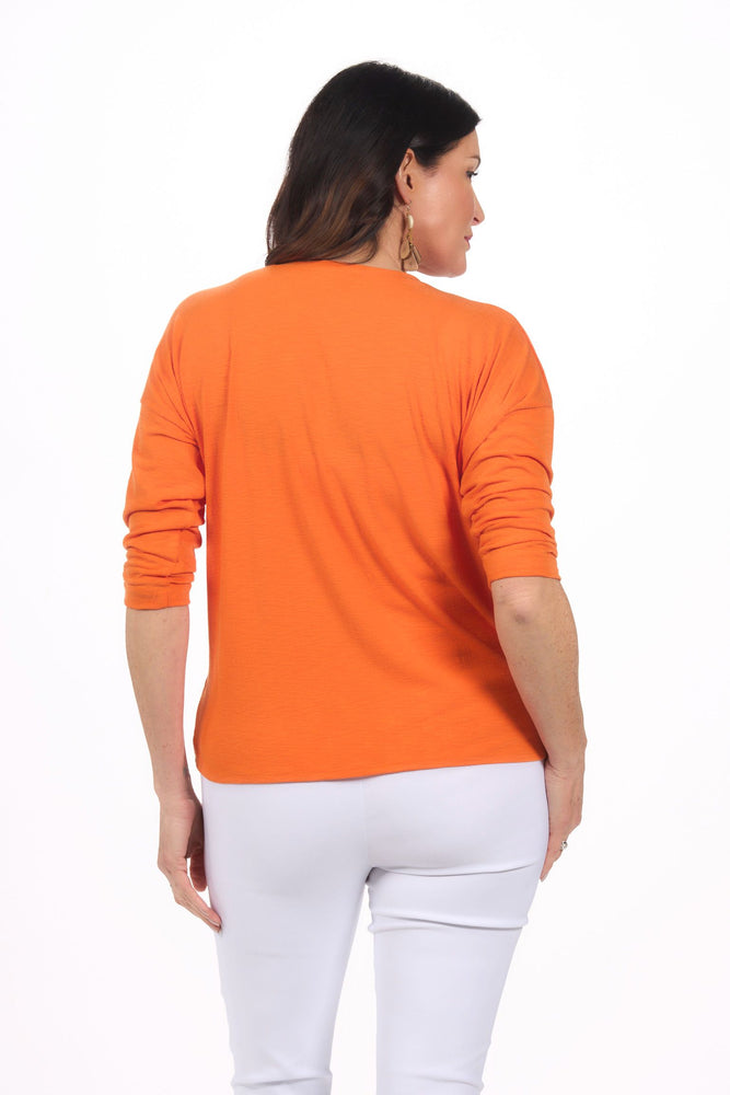 Back image of orange knot top.