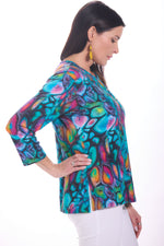 Side image of Parsley and Sage button up detail multi colored jewel top. 