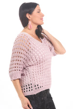 Side image of Look Mode pink open knit sweater.