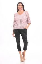 Front image of Look Mode pink open knit sweater.