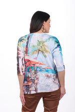 Back image of impulse beach print top. 