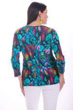 Back image of Parsley and Sage button up detail multi colored jewel top. 