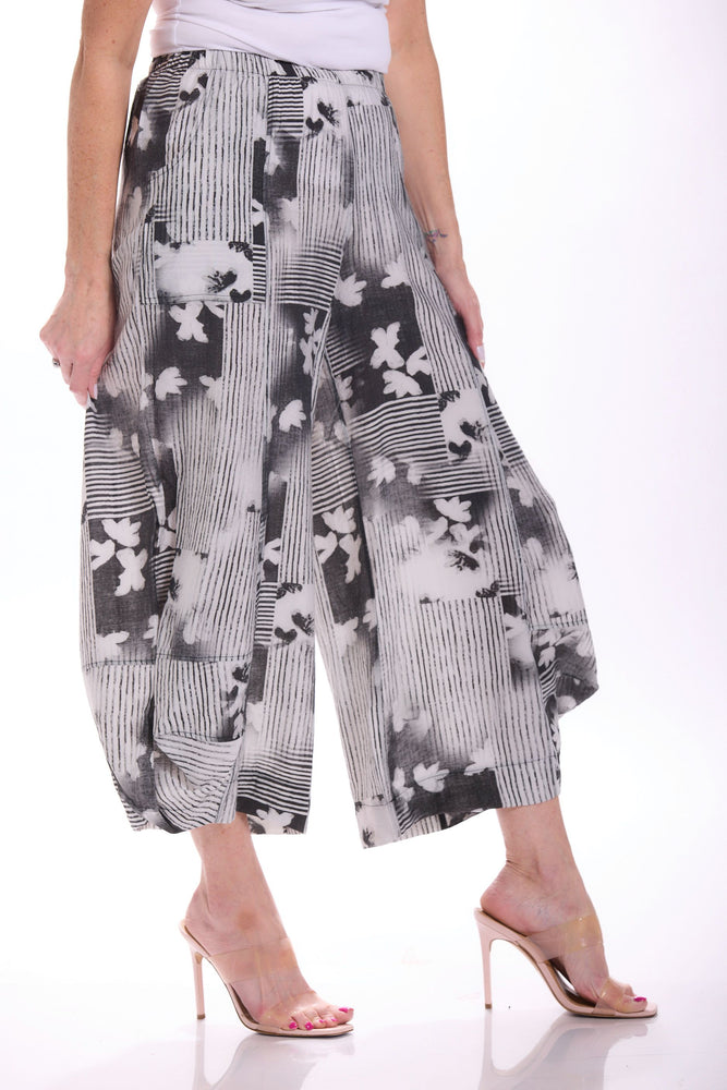 Side image of Shana pull on black and white printed pants. 