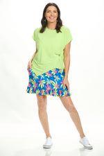 Front image of Fashque printed ruffle skort in royal lime multi print. 