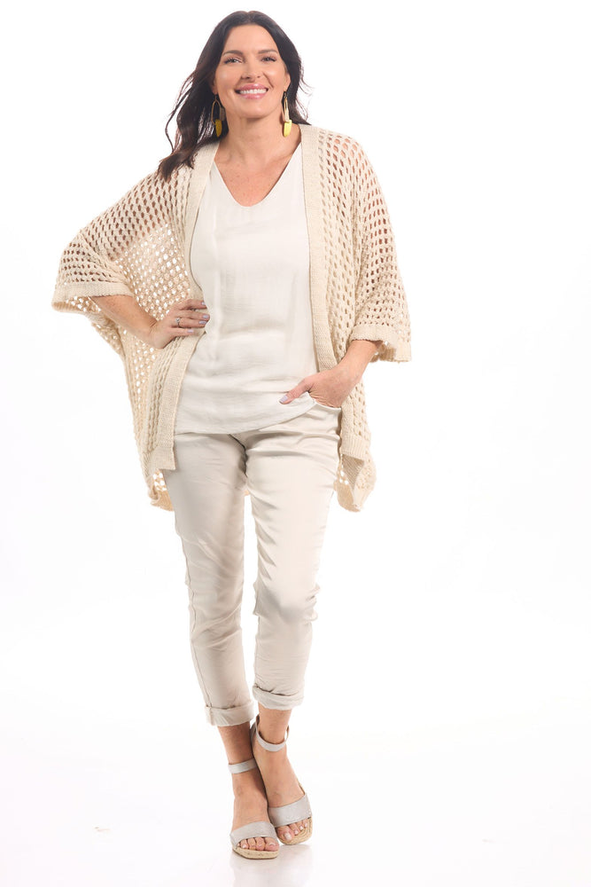 Front image of Gigi Moda Made in italy beige pull on satin pants. 