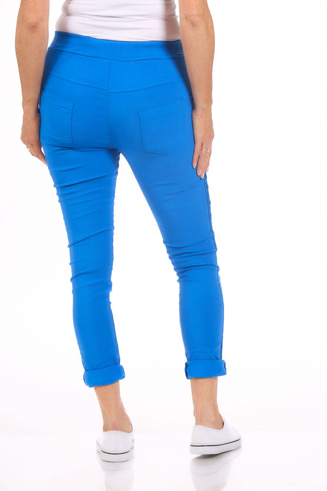 Back image of pull on jeggings in royal blue made in italy. 