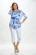 Front image of impulse round neck round hem top in navy clouds. 