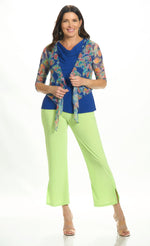 Back image of Mimozza pull on side slit ankle pants in lime green. 