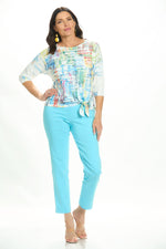 Front image of impulse drop shoulder top in colorful mirage. 