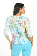 Back image of impulse drop shoulder top in colorful mirage. 