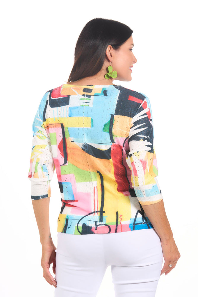 Back image of impulse multi printed top with tie front. 