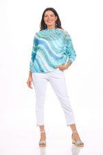 Front image of long sleeve blue wave printed sweater made in italy. 