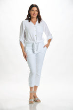 Front image of Made in Italy white button front blouse. 