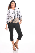 Front image of Tribal black capri with side zipper detail.